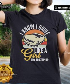 Premium Boostmaster I Know I Drive Like A Girl vintage ladies tee showcasing a stylish graphic design and playful message.
