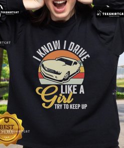 Vintage Premium Boostmaster I Know I Drive Like A Girl Try To Keep Up Sweatshirt in stylish design and bold lettering.