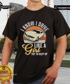 Premium Boostmaster vintage t-shirt featuring 'I Know I Drive Like A Girl, Try To Keep Up' design for car enthusiasts.