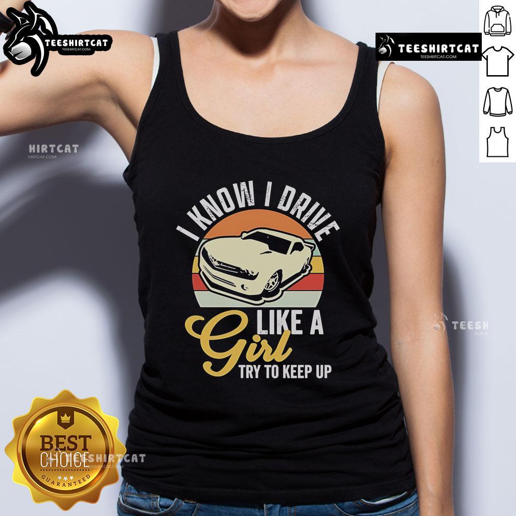 Premium Boostmaster I Know I Drive Like A Girl Try To Keep Up Vintage Tank Top Vintage tank top featuring 'I Know I Drive Like A Girl, Try To Keep Up' slogan from Premium Boostmaster collection.