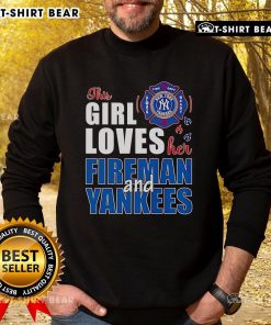 Alt Text: Premium sweatshirt featuring 'This Girl Loves Her Fireman and Yankees', perfect for fans of firemen and baseball.