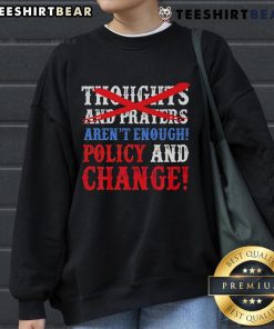 Thoughts and Prayers Aren't Enough sweatshirt promoting policy change for social issues in a stylish, casual design.