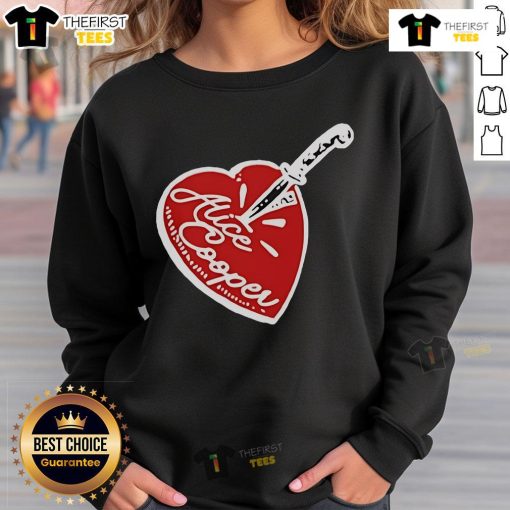 Alt Text: Top Alice Cooper Stab Heart Knife Sweatshirt featuring iconic graphic design and bold colors for rock music fans.