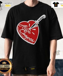 Top Alice Cooper Stab Heart Knife T-Shirt featuring a striking graphic design of a heart pierced by a knife.
