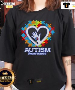 Top Autism Awareness hands and puzzle heart design on a ladies tee shirt, promoting understanding and support for autism.