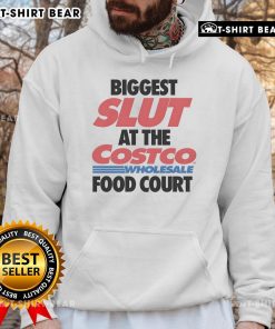 Stylish hoodie featuring 'Top Biggest Slut' design at a bustling wholesale food court, perfect for casual outings.