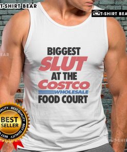 Fashionable model in a tank top at the wholesale food court, showcasing trendy style and confidence.