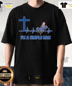 Alt Text: Top Cross Heartbeat Los Angeles Dodgers I'M A Simple Man T-Shirt featuring a stylish design for fans.
