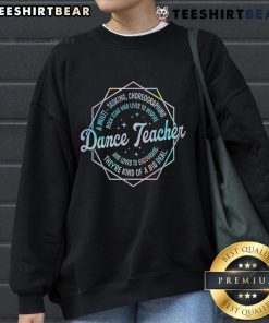 Alt Text: Top dance teacher wearing a cozy sweatshirt, ready for back-to-school dance classes and inspiring students.
