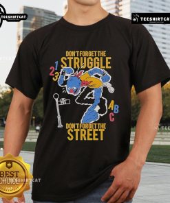 Top Don't Forget The Struggle Don't Forget The Street ABC T-Shirt featuring bold graphic design and vibrant colors.