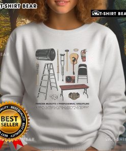 Top Foreign Objects of Professional Wrestling sweatshirt featuring iconic wrestling memorabilia and vibrant graphics.