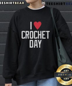 Cozy Top I Heart Crochet Day Sweatshirt showcasing a vibrant crochet-themed design, perfect for crochet enthusiasts.
