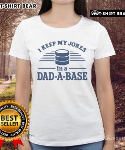 Alt Text: Top I Keep My Jokes In A Dad A Base Ladies Tee featuring a humorous design perfect for casual wear.