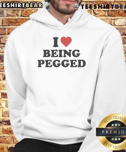 Alt Text: Top I Love Being Pegged Hoodie - trendy graphic sweatshirt showcasing playful humor and bold style for casual wear.
