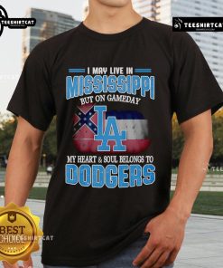 Top I May Live In Mississippi But On Gameday My Heart And Soul Belongs To Dodgers T-Shirt displayed on a hanger.