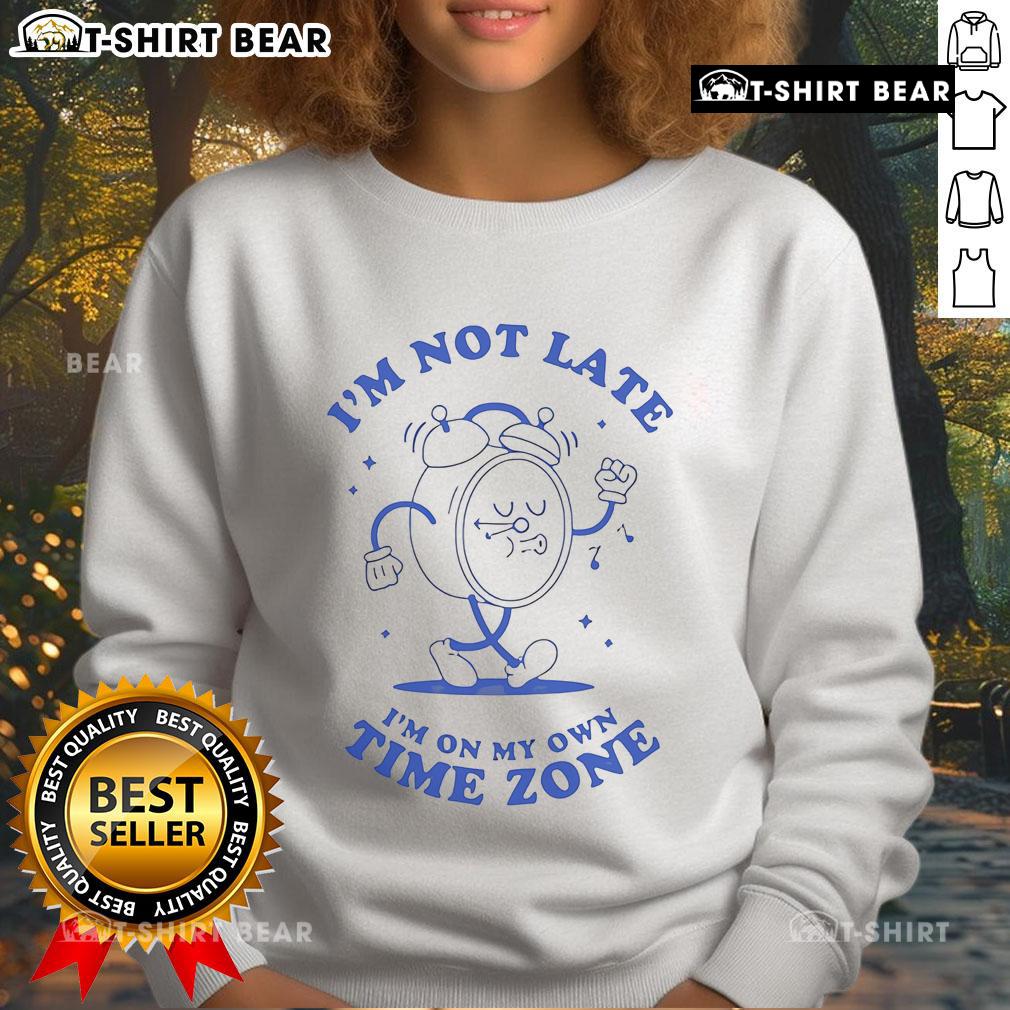 Top I'M Not Late On My Own Time Zone Clock Sweatshirt Cozy sweatshirt featuring a playful clock graphic with the phrase 'I'm Not Late, I'm On My Own Time Zone' design.