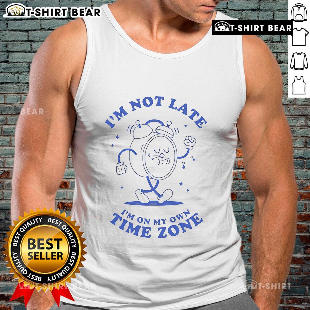 Top I'M Not Late On My Own Time Zone Clock Tank Top Trendy 'I'm Not Late, I'm On My Own Time Zone' clock tank top displayed on a mannequin, perfect for casual wear.