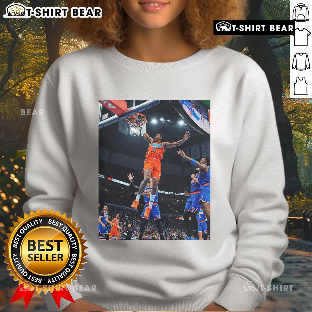 Top Jalen Williams Flying Score Black Game Frames Oklahoma Sweatshirt Alt Text: Jalen Williams soaring for a score in a black Oklahoma sweatshirt, showcasing athleticism and team spirit.