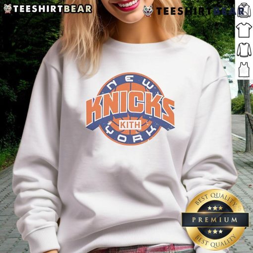 Stylish Top Kith sweatshirt for New York Knicks NBA Playoffs 2025, featuring bold team colors and logo design.
