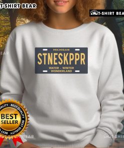 Cozy sweatshirt featuring the 'Top Michigan Stoneskipper Water Winter Wonderland' license plate design, perfect for winter wear.