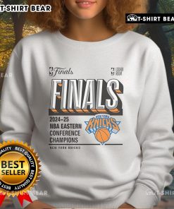 New York Knicks 2025 NBA Eastern Conference Champions sweatshirt displayed in locker room setting.