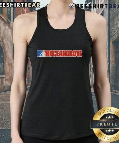 Top Ocean Grove Nu Metal Tank Top displayed on a model against a vibrant urban backdrop, showcasing trendy streetwear style.