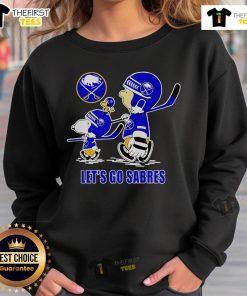 Buffalo Sabres sweatshirt featuring Snoopy, Charlie Brown, and Woodstock with 'Let's Go Sabres' slogan.