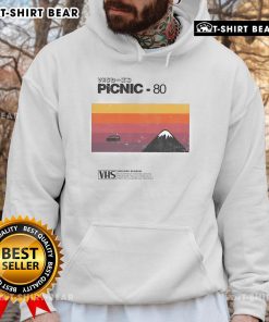Cozy 'Top Picnic 80' VHS holiday season hoodie displayed on a wooden table, perfect for festive gatherings.