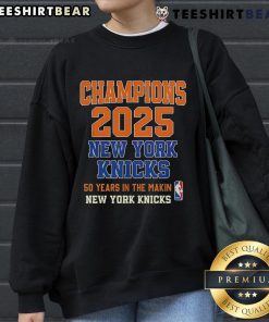 Alt Text: New York Knicks Champions sweatshirt celebrating years of playoffs success, perfect for fans at the game or home.