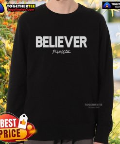 Rhett Walker Believer sweatshirt displayed on a hanger, featuring a stylish design and comfortable fabric for fans.