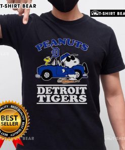 Alt Text: Top Snoopy and Woodstock Peanuts Detroit Tigers T-Shirt featuring vibrant graphics and team colors for fans.