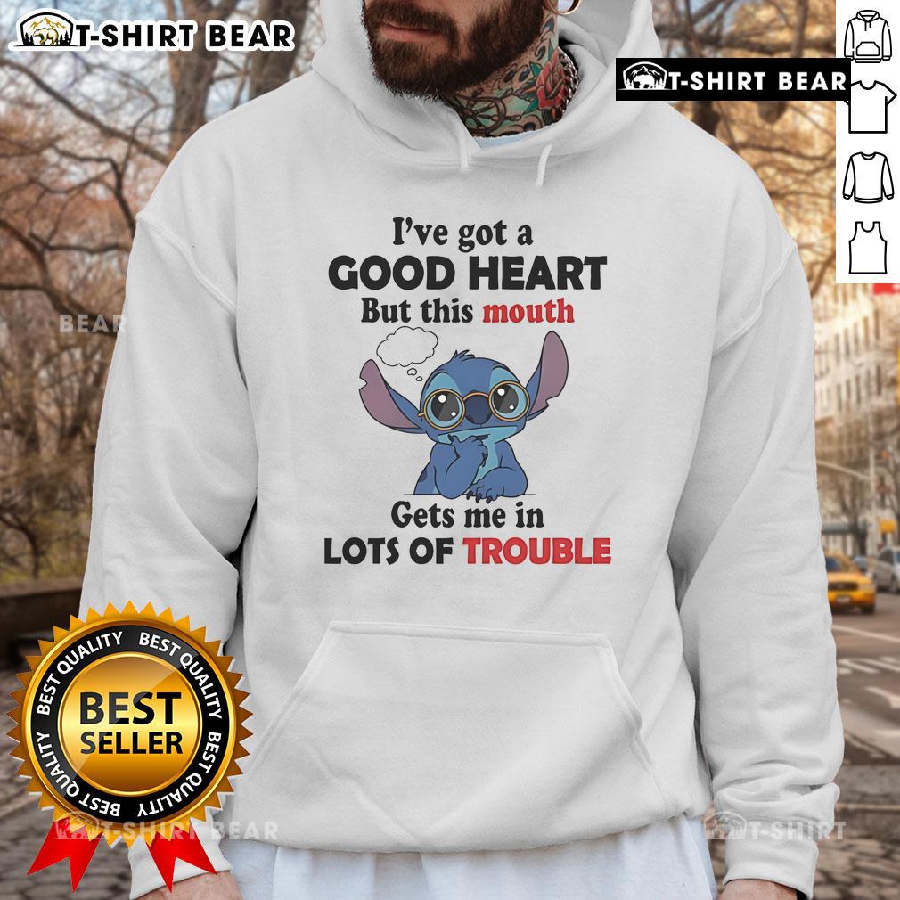 Top Stitch I've Got A Good Heart But This Mouth Gets Me In Lots Of Trouble Hoodie Alt Text: Person wearing 'I've Got A Good Heart But This Mouth Gets Me In Lots Of Trouble' hoodie, showcasing stylish streetwear.