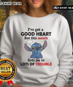 Alt Text: Cozy 'I've Got A Good Heart But This Mouth Gets Me In Lots Of Trouble' sweatshirt, perfect for casual wear and making a statement.
