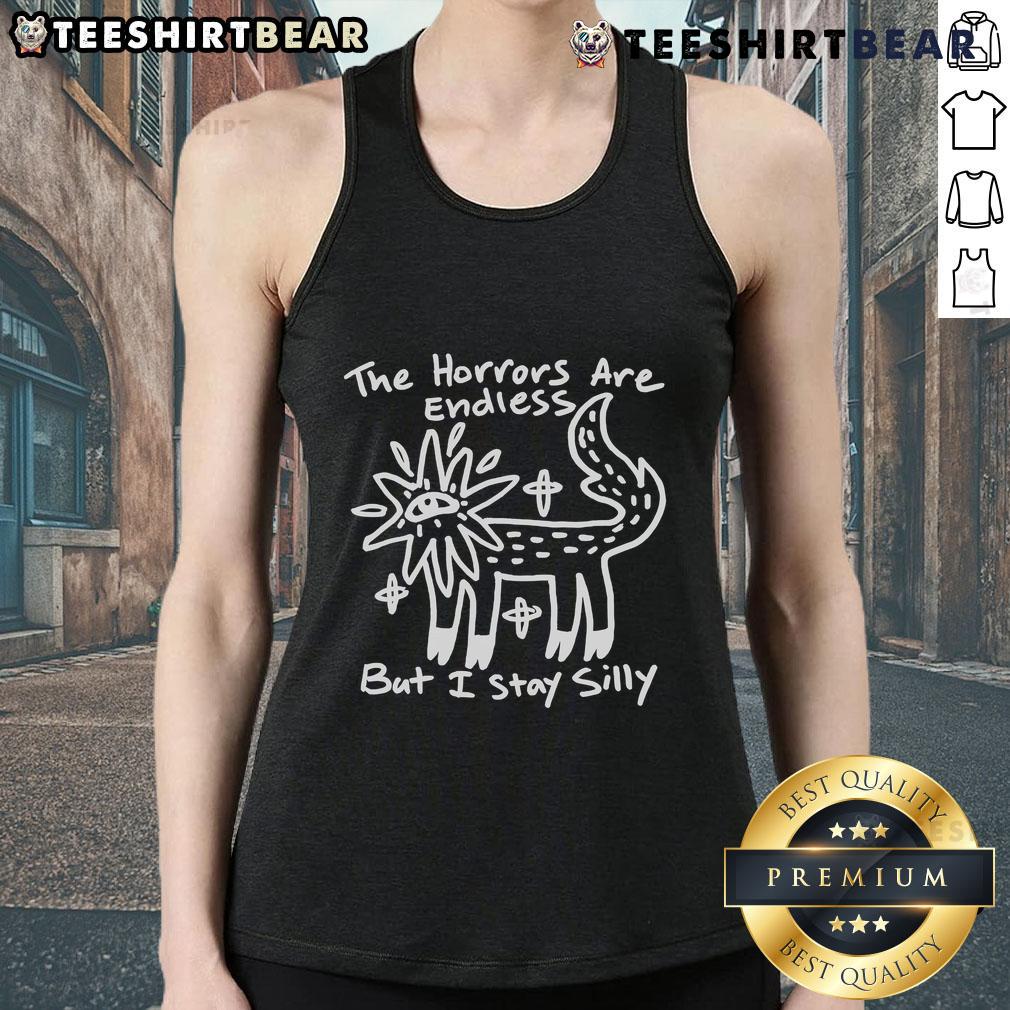 Top The Horrors Are Endless But I Stay Silly Tank Top Top The Horrors Are Endless But I Stay Silly Tank Top featuring a playful design on a trendy tank top for casual wear.