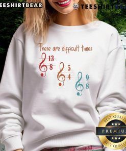 Cozy musician sweatshirt featuring 'Top These Are Difficult Times' slogan, perfect for casual wear and music lovers.