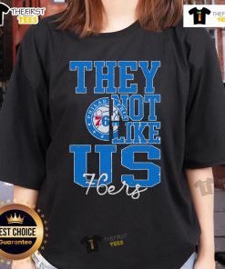 Alt Text: Top They Not Like Us Philadelphia 76ers basketball ladies tee in vibrant red, perfect for fans and game day style.