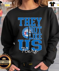 Philadelphia 76ers basketball sweatshirt featuring 'Top They Not Like Us' design, perfect for fans and cozy wear.
