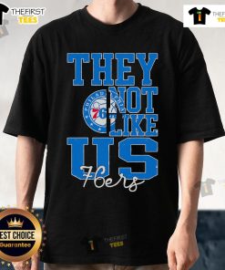 Alt Text: Top They Not Like Us Philadelphia 76ers Basketball T-Shirt featuring bold team graphics and vibrant colors.