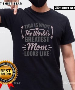 Alt Text: Woman wearing 'Top This Is What The World's Greatest Mom Looks Like' T-shirt, showcasing love and pride for moms.
