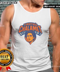 Timothe Chalamet in New York wearing a stylish tank top, showcasing his trendy fashion sense as a top actor.