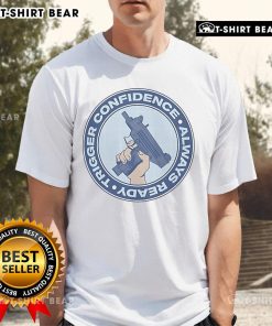 Top Trigger Confidence Always Ready Gun Circle Logo T-Shirt featuring a bold logo on a stylish graphic tee.