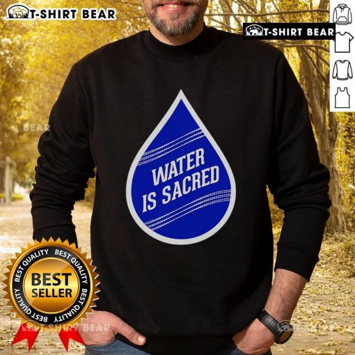 Top Water is Sacred sweatshirt featuring a stylish design promoting water conservation and environmental awareness.