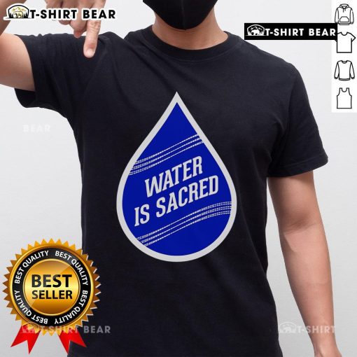Top Water Is Sacred T-Shirt featuring a bold graphic design promoting water conservation and environmental awareness.