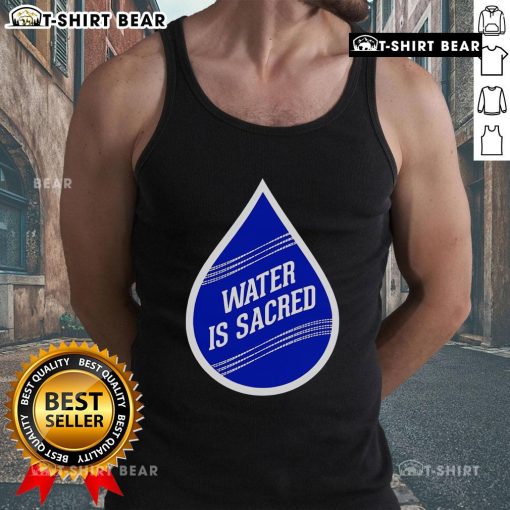 Model wearing 'Top Water is Sacred' tank top, showcasing eco-friendly fashion and promoting water conservation.