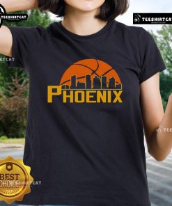 Alt Text: Premium Phoenix Suns cityscape skyline style 2025 ladies tee showcasing vibrant team colors and stylish design.