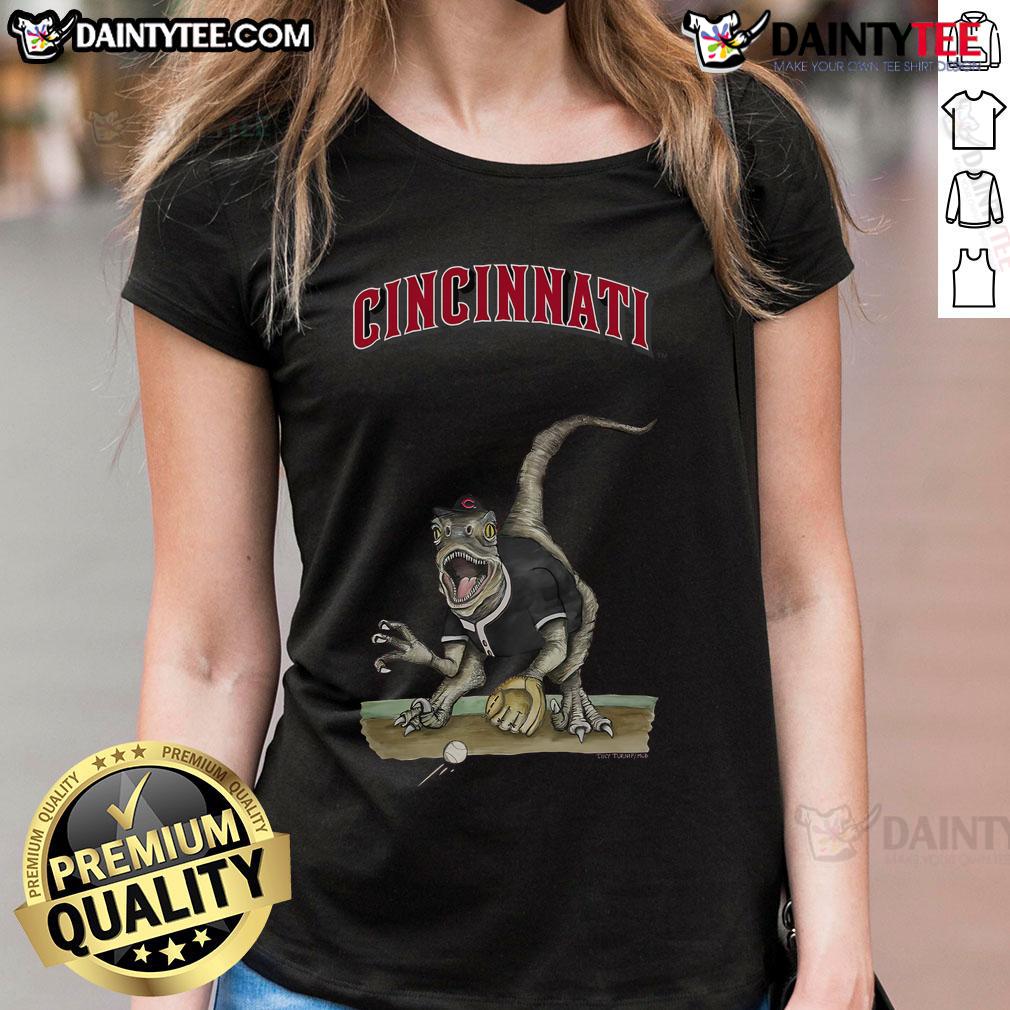 Awesome Cincinnati Reds Tiny Turnip Velociraptor Ladies Tee Alt Text: Awesome Cincinnati Reds Tiny Turnip Velociraptor Ladies Tee featuring a fun dinosaur graphic and vibrant team colors.