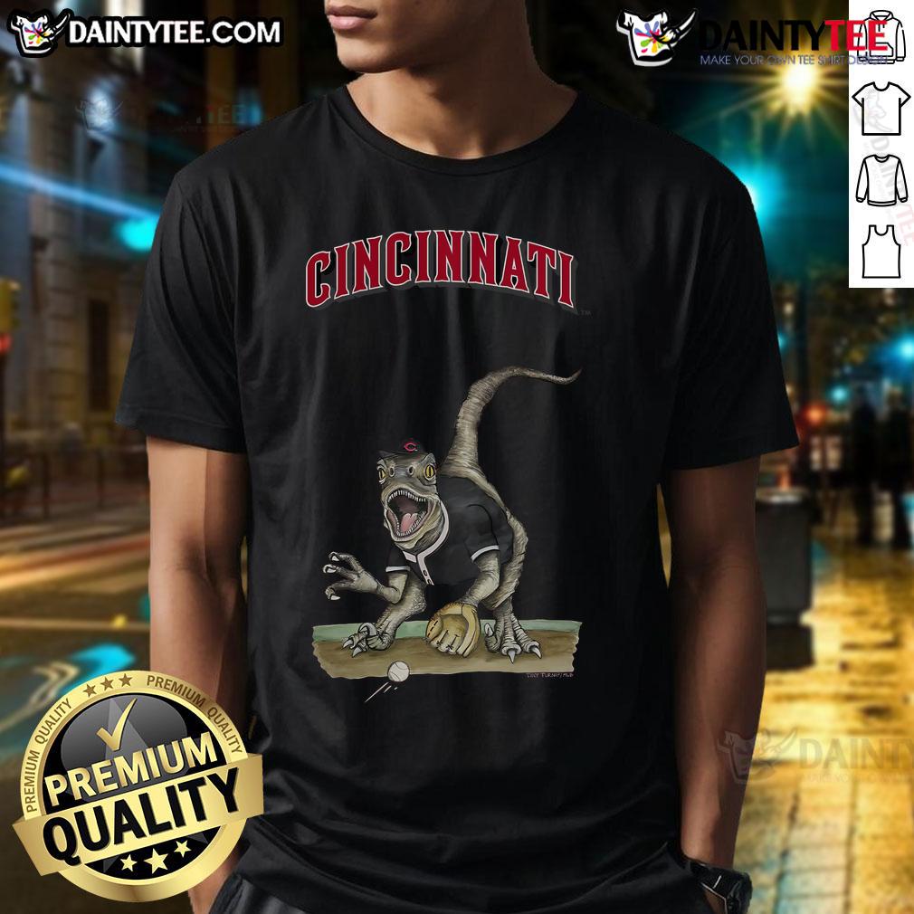 Awesome Cincinnati Reds Tiny Turnip Velociraptor T Shirt Awesome Cincinnati Reds Tiny Turnip Velociraptor T-Shirt featuring a playful dinosaur design, perfect for young fans.
