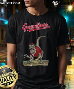 Alt Text: Awesome Cleveland Guardians Tiny Turnip Velociraptor T-Shirt featuring a playful dinosaur design for fans.