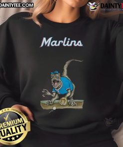 Alt Text: Awesome Miami Marlins tiny turnip velociraptor sweatshirt featuring vibrant colors and playful dinosaur design.