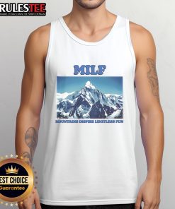 Awesome MILF in a fun tank top against stunning mountain backdrop, embodying limitless adventure and style.